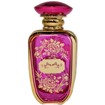 Spary bottle with a reflective gold metal body and rounded rectangular shape. The front features a  decorative panel with an intricate floral lattice pattern. The bottle has a gold atomizer spray and a gold cap.