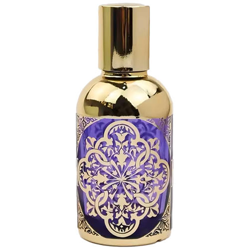 Cylindrical spray bottle with a polished gold cap and gold upper section. The lower half is rich purple and features a large circular ornamental medallion design accented with gold details.