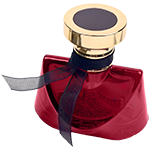Red trapezoidal glass spray bottle featuring sweeping, curved shoulder that taper into a narrow neck, topped with a chunky gold circular pedestal cap.